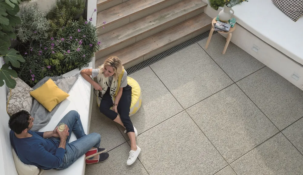 Beautiful Granite paving couple sat on seating