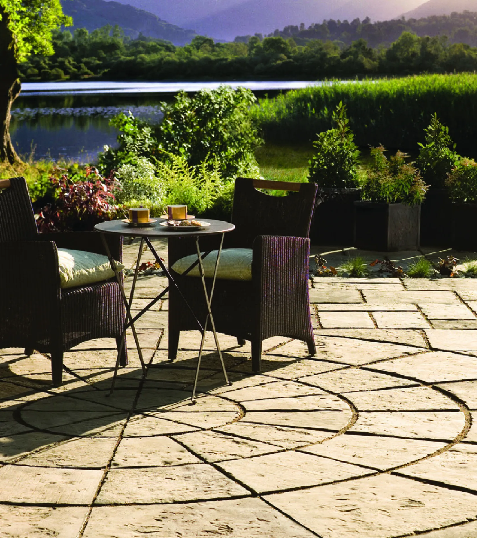 Cottage garden inspired with rustic circular paving