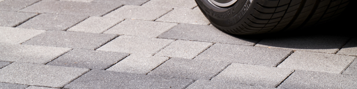 block paving with car tyre