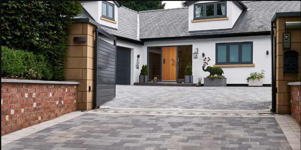 Couple browsing laying patterns in Bradstone brochure